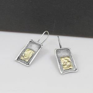 Ręcznie wykonane kolczyki srebrne z widoczną fakturą
